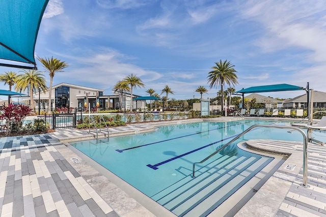 view of swimming pool with a patio