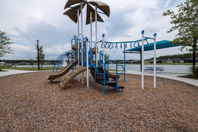 view of playground featuring a water view