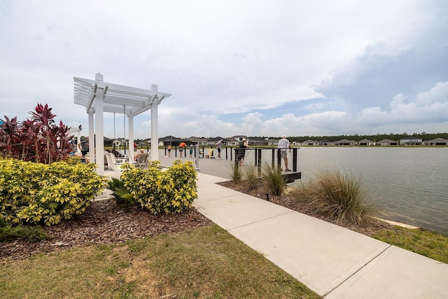 dock area featuring a water view and a pergola