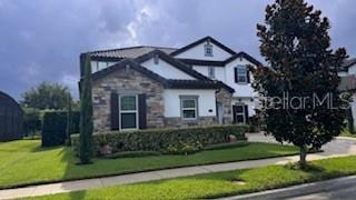 view of front of house with a front lawn