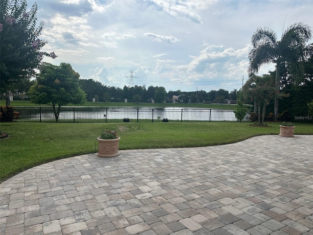6301 Swanson St, Windermere, FL 34786 - view of patio with a water view