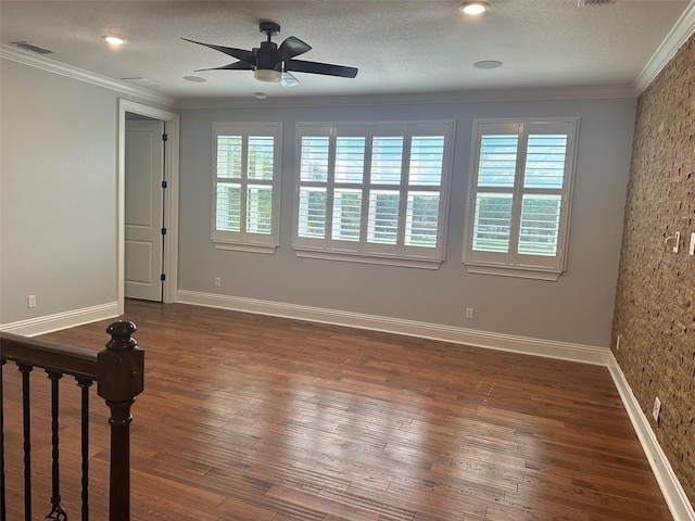 6301 Swanson St, Windermere, FL 34786 - spare room with plenty of natural light, ceiling fan, dark wood-type flooring, baseboards, and ornamental molding