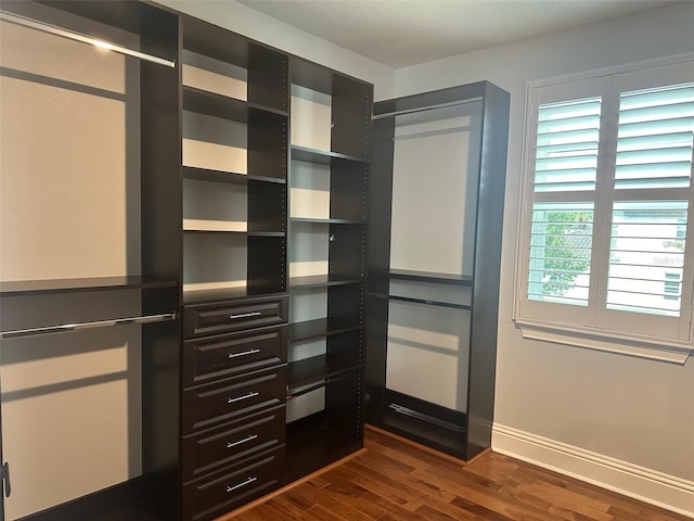 6301 Swanson St, Windermere, FL 34786 - walk in closet featuring dark wood finished floors