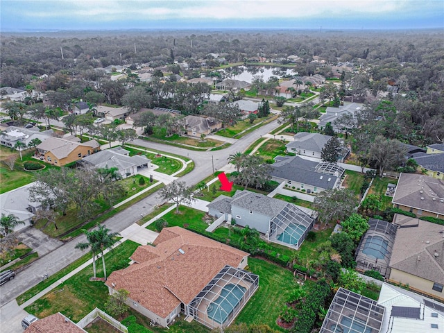 birds eye view of property with a residential view