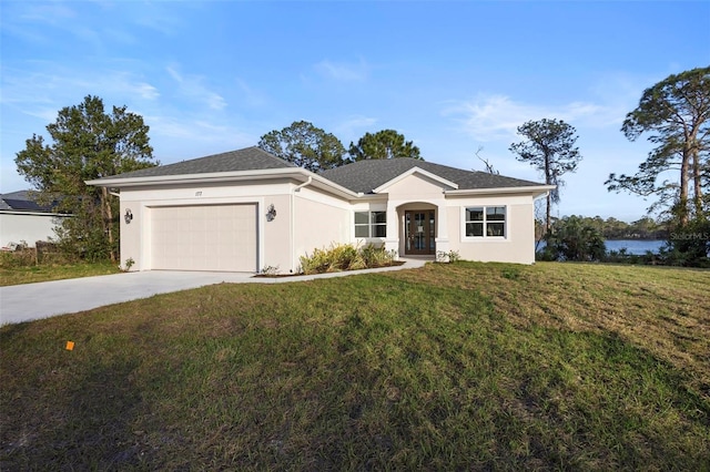 ranch-style home with driveway, stucco siding, a garage, and a front yard