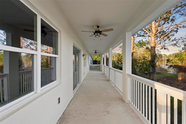 patio terrace at dusk with a ceiling fan