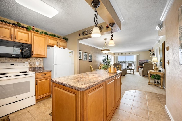 kitchen with hanging light fixtures, a center island, light tile patterned floors, white appliances, and a textured ceiling