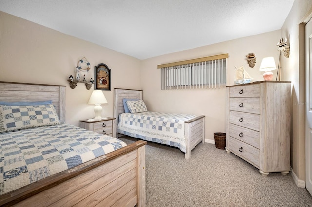 bedroom featuring light colored carpet