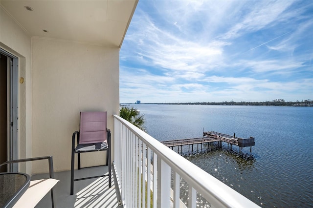 balcony featuring a water view