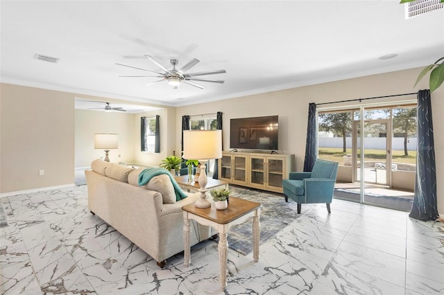 living area with ornamental molding, visible vents, marble finish floor, and ceiling fan