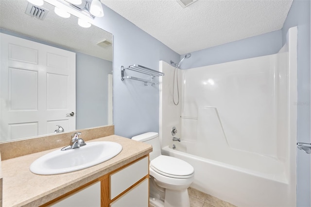 bathroom with toilet, a textured ceiling, vanity, and visible vents