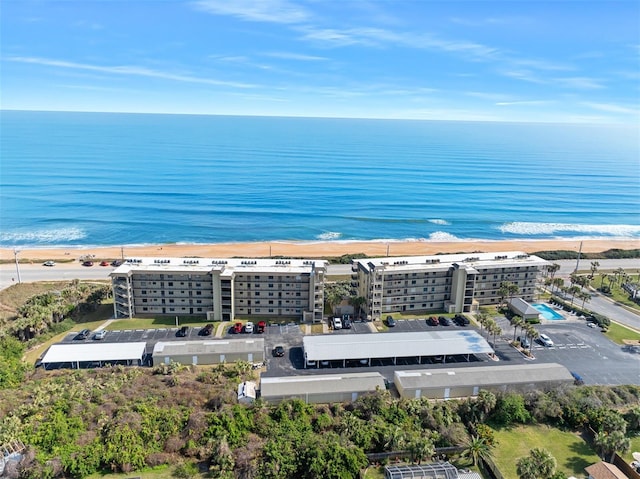 aerial view with a view of the beach and a water view