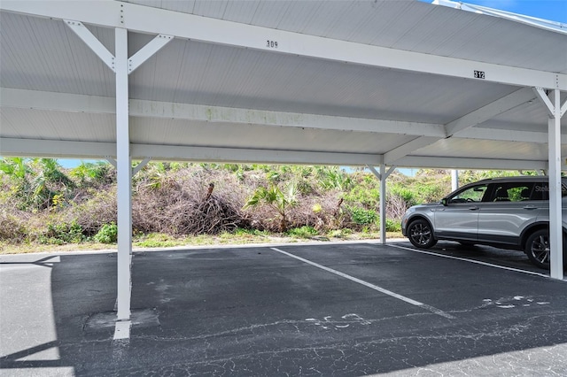 3180 Ocean Shore Blvd Unit 309, Ormond Beach, FL 32176 - view of covered parking lot
