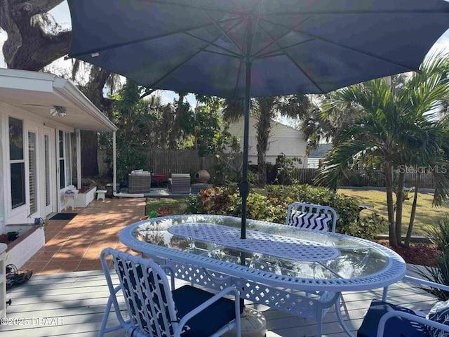 view of patio / terrace featuring central AC and a deck