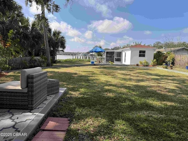 view of yard with an outdoor structure