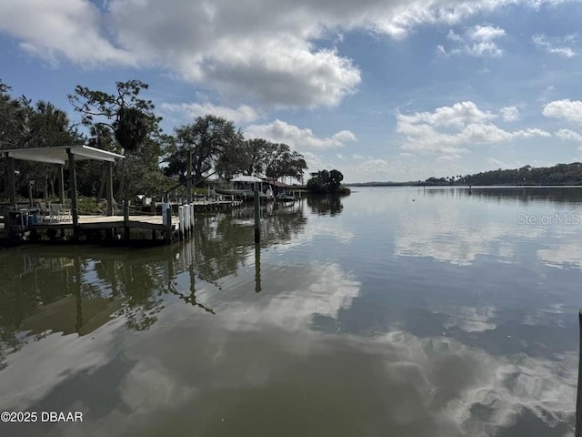 dock area featuring a water view