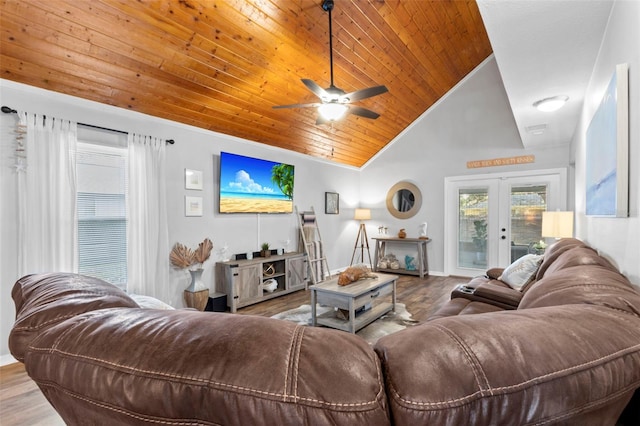 living room with french doors, lofted ceiling, hardwood / wood-style floors, and wooden ceiling