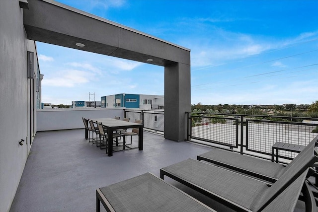 view of patio / terrace with a balcony