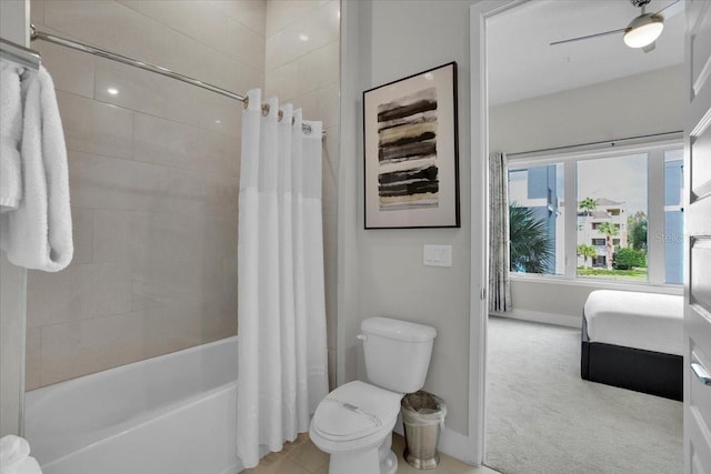 bathroom featuring shower / bathtub combination with curtain, ceiling fan, and toilet