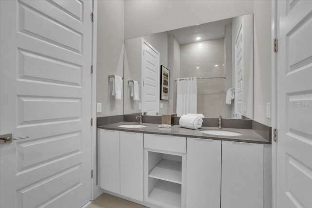 bathroom with vanity and a shower with curtain