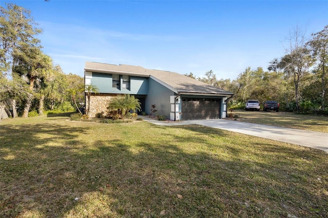 view of front facade featuring a garage and a front yard