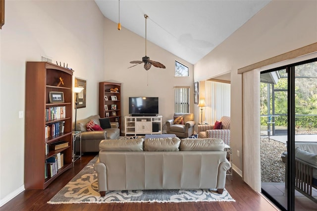 living room featuring ceiling fan, high vaulted ceiling, and dark hardwood / wood-style flooring