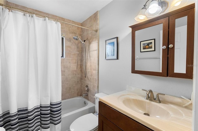 full bathroom with vanity, toilet, and shower / bath combo