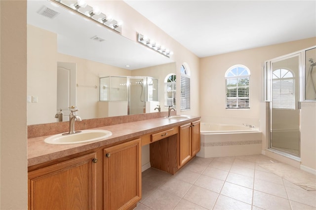 bathroom featuring vanity, plus walk in shower, and tile patterned flooring