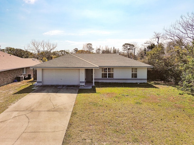 ranch-style home with a garage, cooling unit, and a front yard