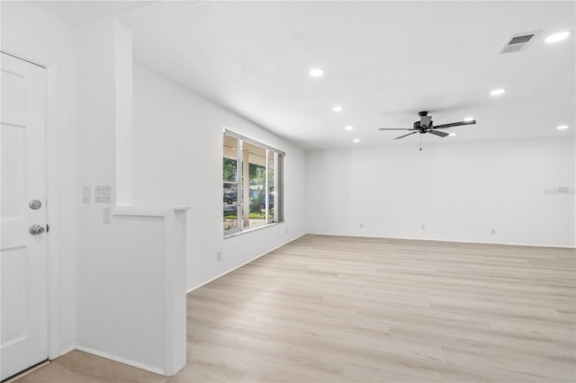 unfurnished room with light hardwood / wood-style floors and ceiling fan