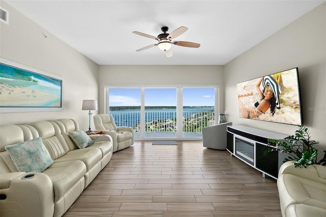 living room with ceiling fan