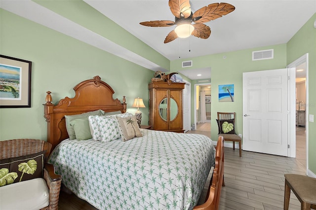 bedroom featuring hardwood / wood-style flooring and ceiling fan