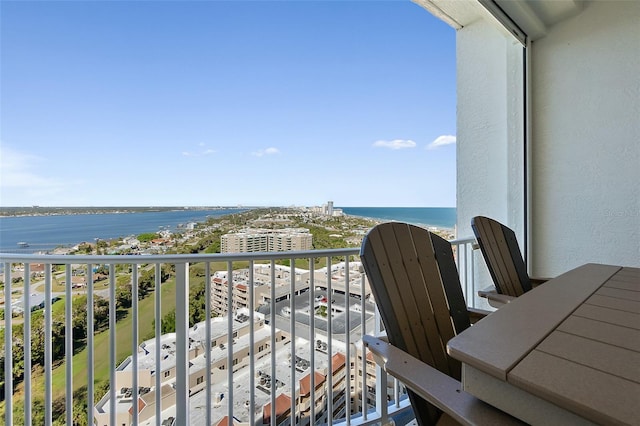 balcony featuring a water view