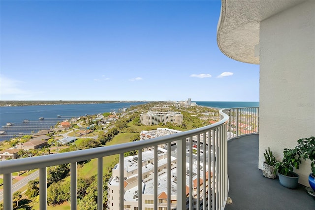 balcony featuring a water view