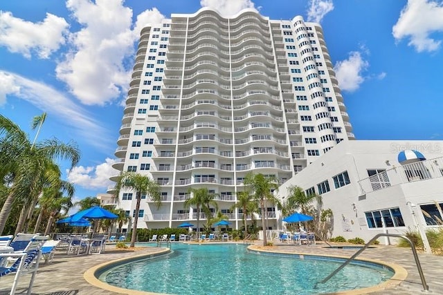 view of swimming pool featuring a patio