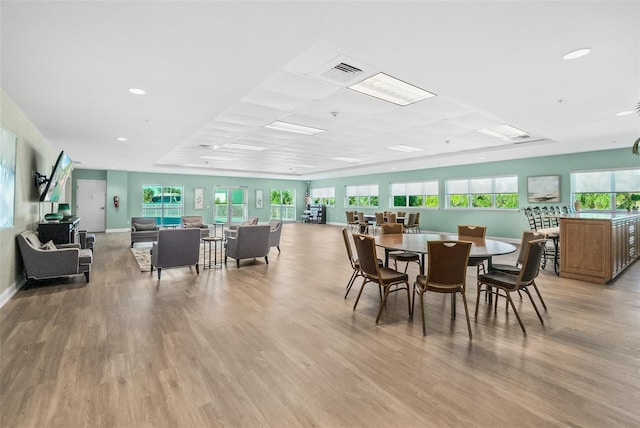 dining space featuring light wood-type flooring