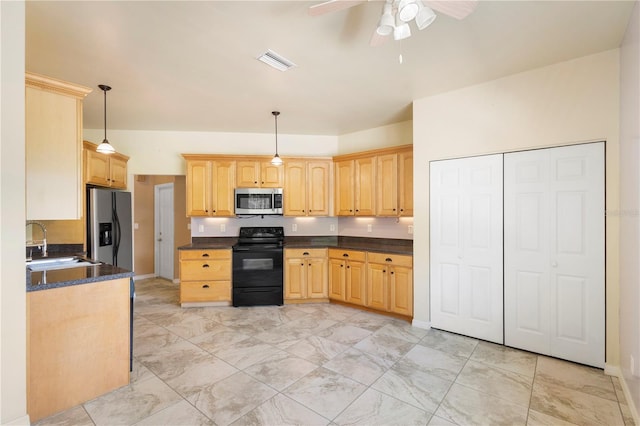 kitchen featuring light brown cabinetry, sink, appliances with stainless steel finishes, pendant lighting, and ceiling fan