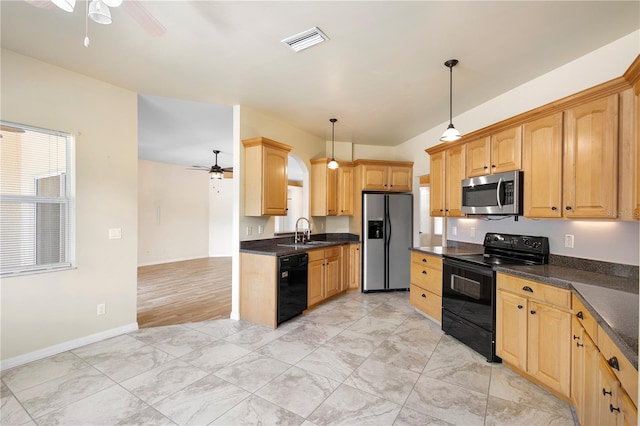 kitchen featuring sink, ceiling fan, hanging light fixtures, black appliances, and light brown cabinets