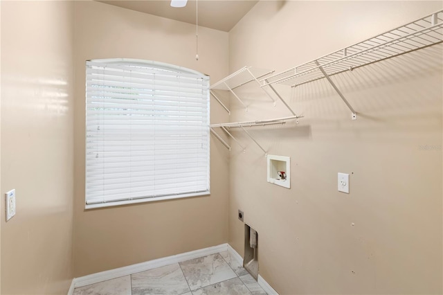 laundry room with hookup for an electric dryer and hookup for a washing machine