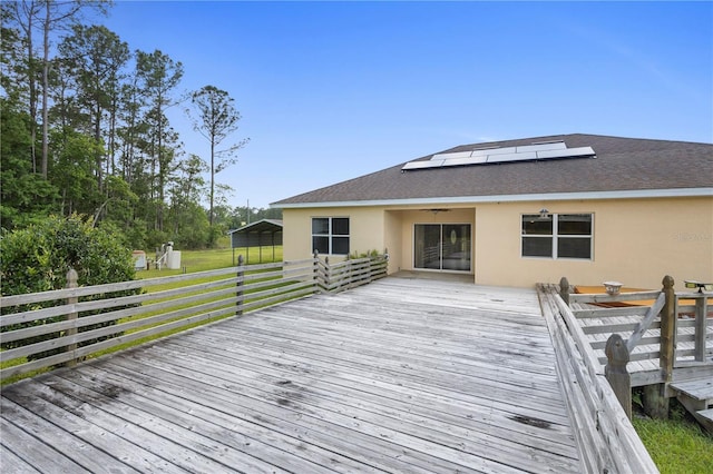 deck featuring a carport