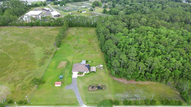 birds eye view of property featuring a rural view