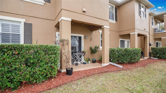 221 Aston Grande Dr, Daytona Beach, FL 32124 - entrance to property featuring a patio area