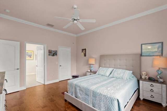 bedroom with hardwood / wood-style flooring, ceiling fan, and ornamental molding