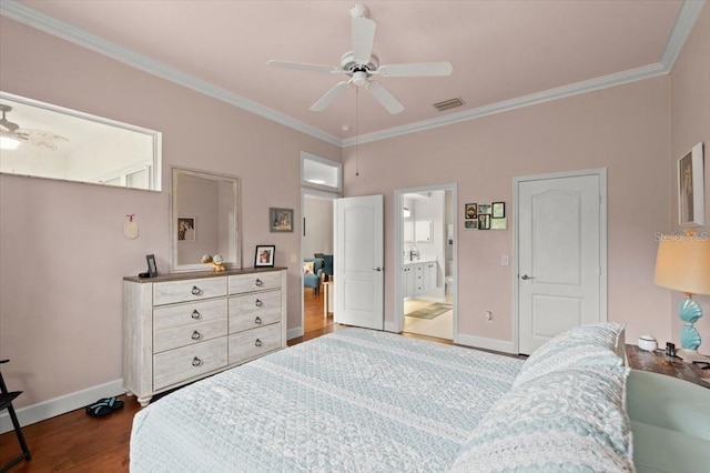 bedroom featuring hardwood / wood-style flooring, ornamental molding, connected bathroom, and ceiling fan