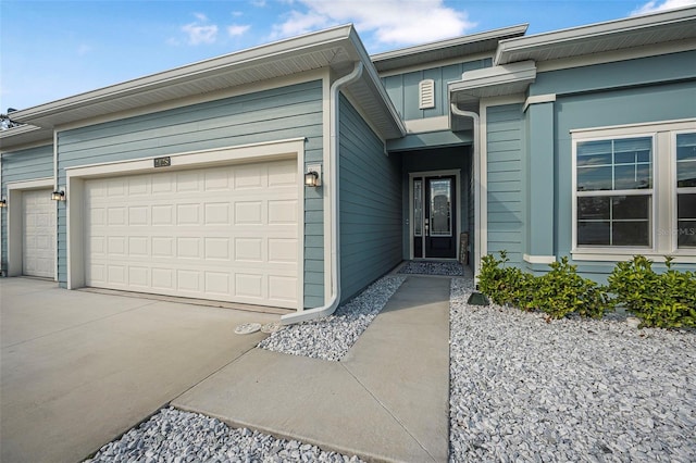 entrance to property featuring a garage