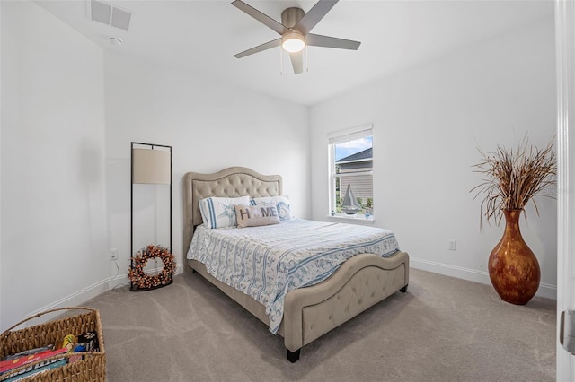 bedroom with light colored carpet and ceiling fan