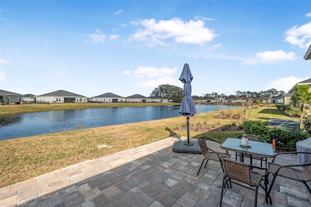 view of patio / terrace featuring a water view