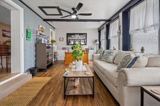 living room with hardwood / wood-style flooring and ceiling fan