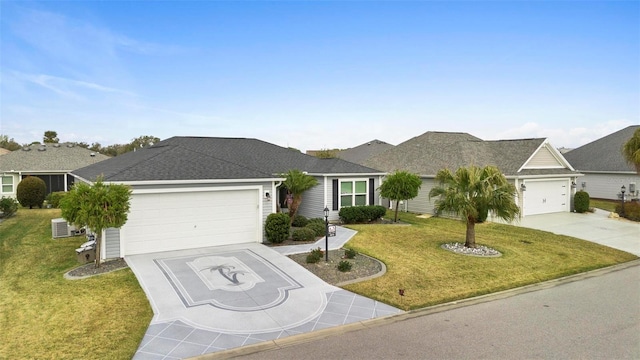 single story home with cooling unit, a garage, and a front yard