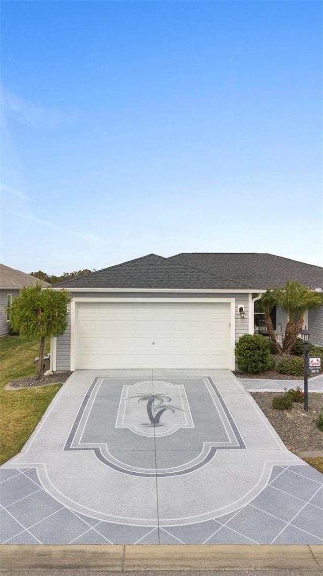 ranch-style home featuring a garage